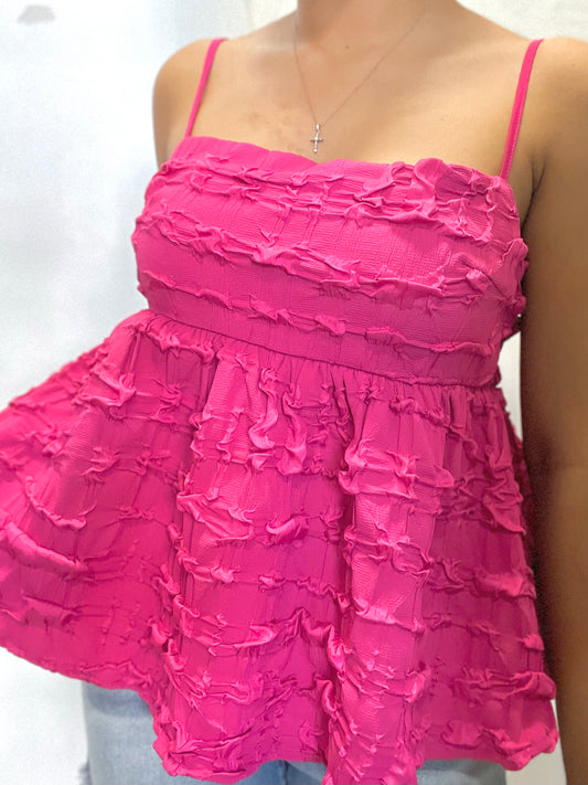 Fuchsia pink thin strap babydoll top. Ruffled texture. Fitted on top and flows out. 